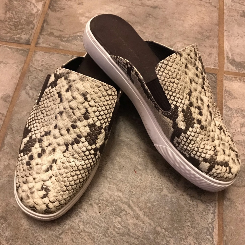 Snakeskin pattern love and legend mule sneakers.